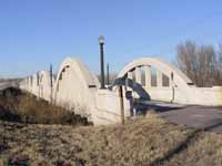 [Photo of the Marsh Rainbow Arch Bridge]