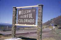 [Photo of a sign that reads 'Welcome to Colorful Colorado']